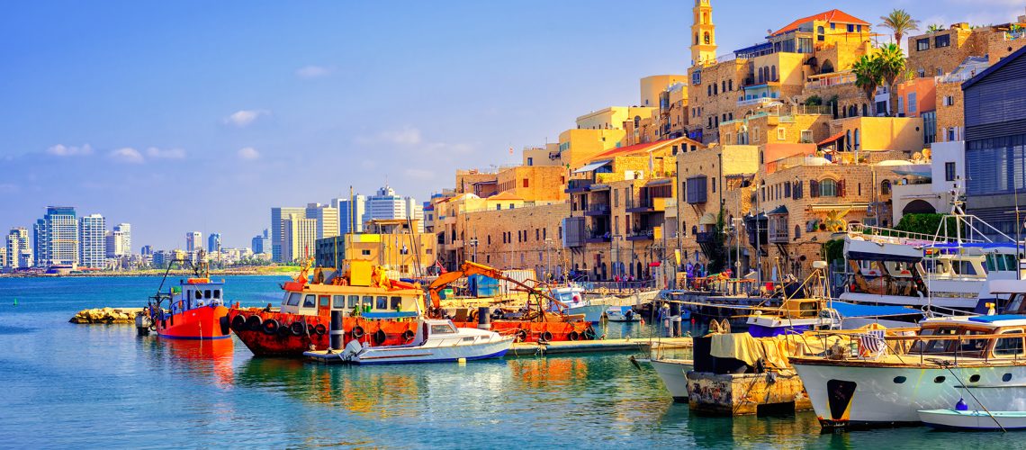 Old town and port of Jaffa and modern skyline of Tel Aviv city, Israel