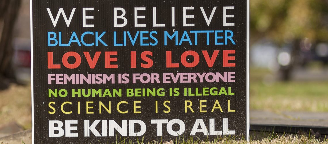 Rockville, MD, USA 11/22/2020: a manifesto on a yard sign with elements of progressive agenda such as humanism, anti racism, pro immigration, pro gay rights, equality, woman rights, and rationalism.
