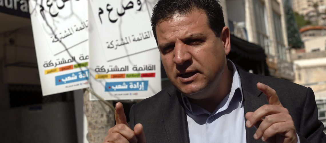 epa04644809 Ayman Odeh, leader of Hadash party and running for the United Arab List in 17 March Knesset elections, meets with journalists in Nazareth, Israel,  02 March 2015. Opinion polls suggest their United List would be the third largest party in the 120-seat Knesset with 12 seats, outstripping ultra-nationalist Avigdor Lieberman, whose Israel Beiteinu party initiated the higher threshold and is projected to win six seats.  EPA/ATEF SAFADI